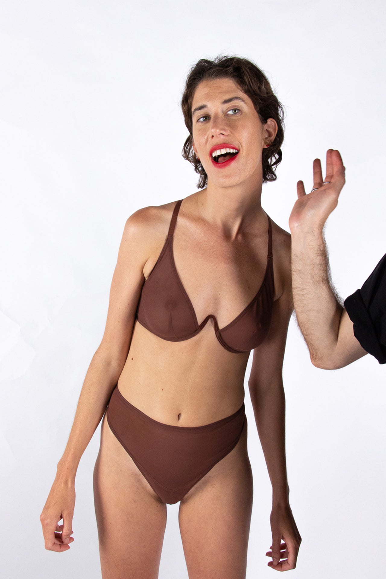 La Fille d'O mid-high rise Pierrot thong in chocolate brown. Front view shown on model wearing matching Fast Girls monowire plunge bra.