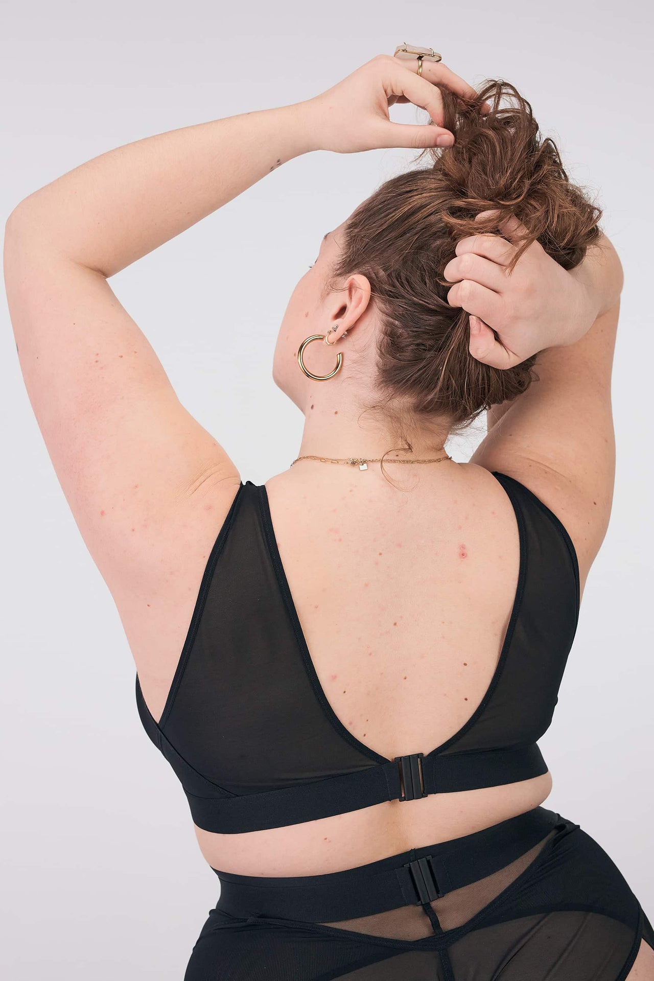La Fille d'O Real Cool/Ramble On bralette in black, shown on model, front view