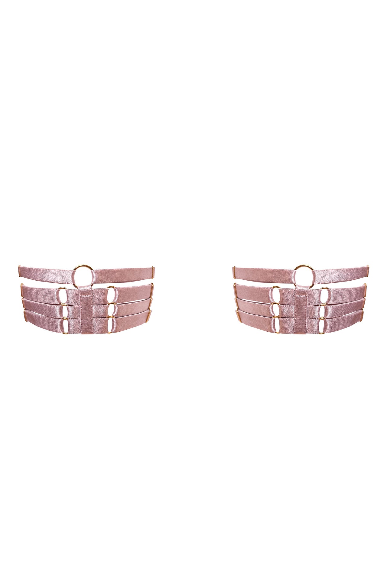 Bordelle Retta garters in rose pink with gold hardware. Thin upper straps with wider lower strap that has a thin strap on top of it attached by triangular branded hardware pieces. Upper and lower straps are joined by a gold O-ring. 