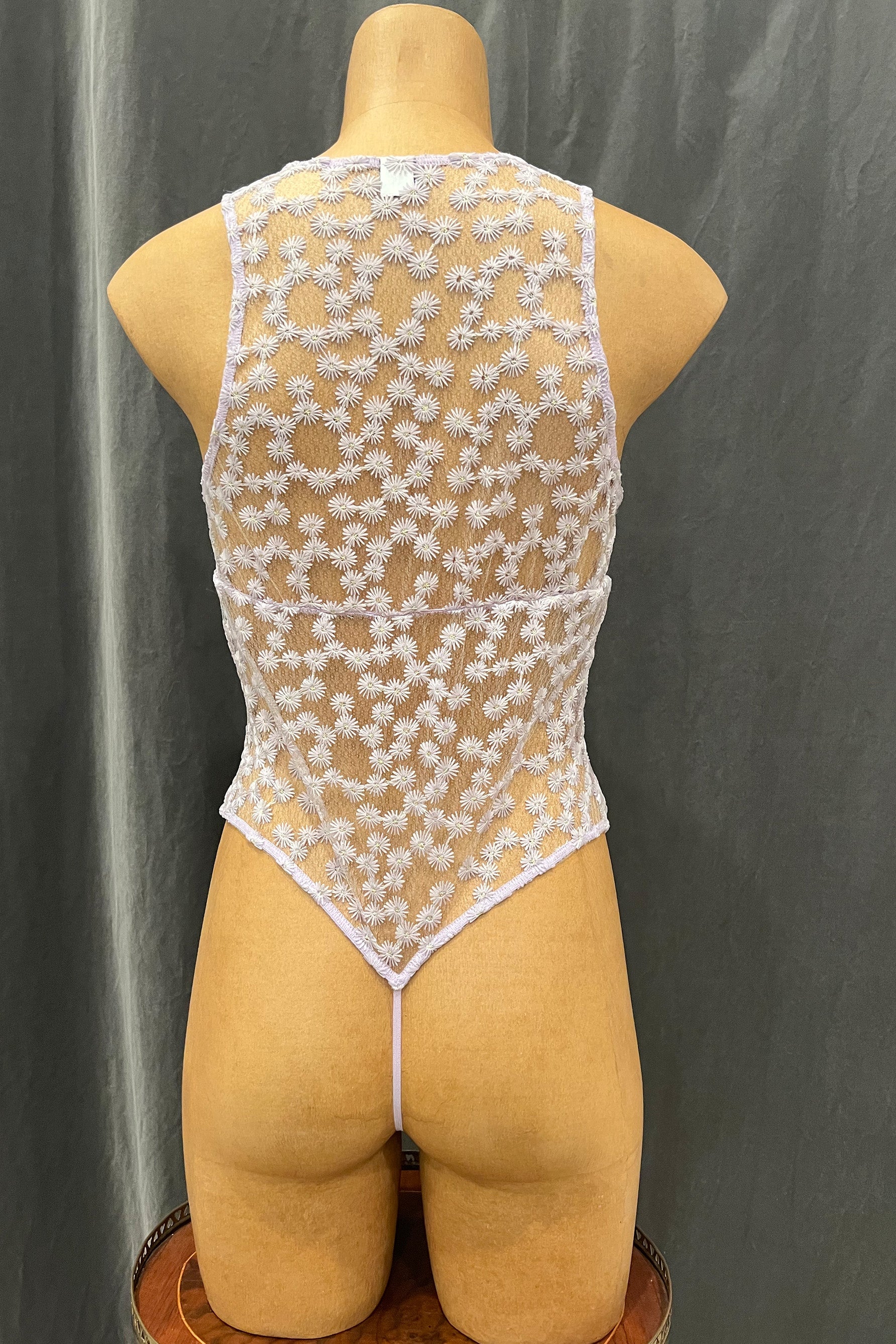 Only Hearts Isabel Bonbon lilac daisy embroidered thong bottom bodysuit. Back view. 