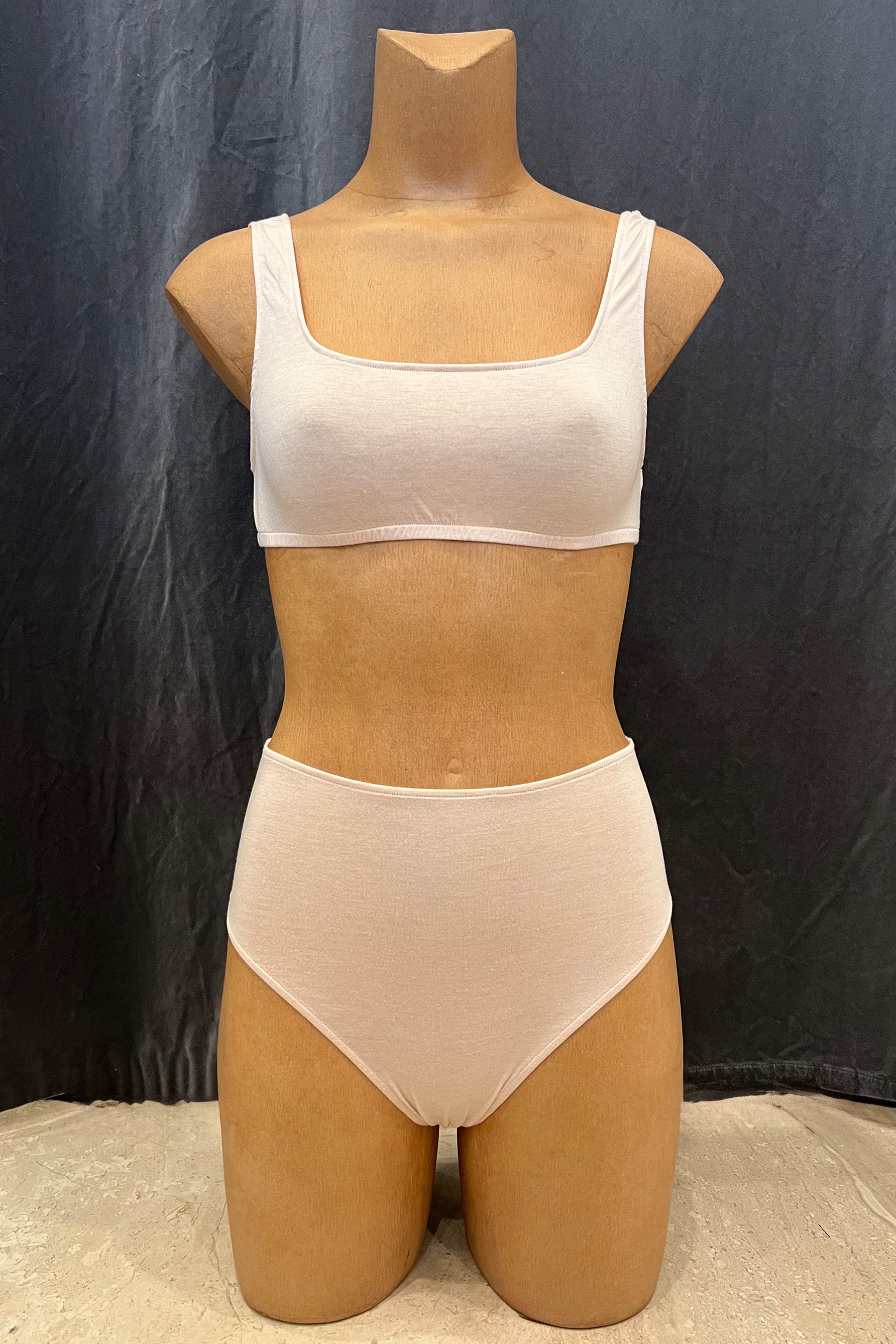 Only Hearts soft tank style Underpinnings bralette in light pink Chai. Front view on mannequin in matching high waist brief. 